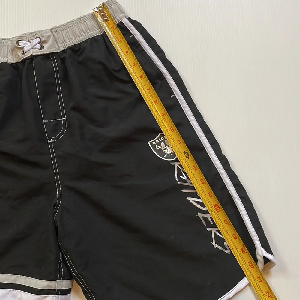 NFL Oakland Raiders black & white board short, swim trunk.  Boys large 14-16